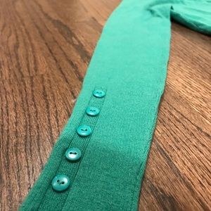 Beautiful turquoise cardigan.